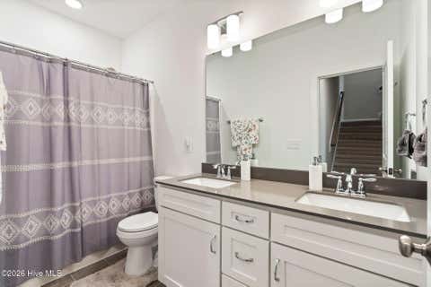 Tiny photo for 302 Sailor Sky Way, Hampstead, NC 28443 (MLS # 100592184)