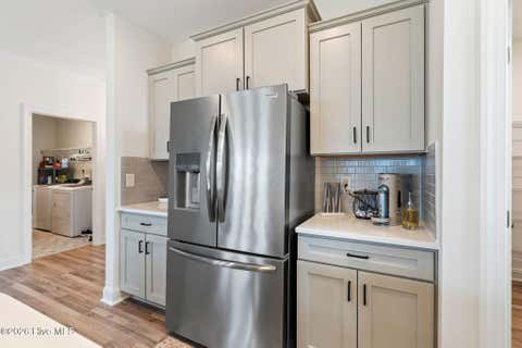 Tiny photo for 302 Sailor Sky Way, Hampstead, NC 28443 (MLS # 100592184)
