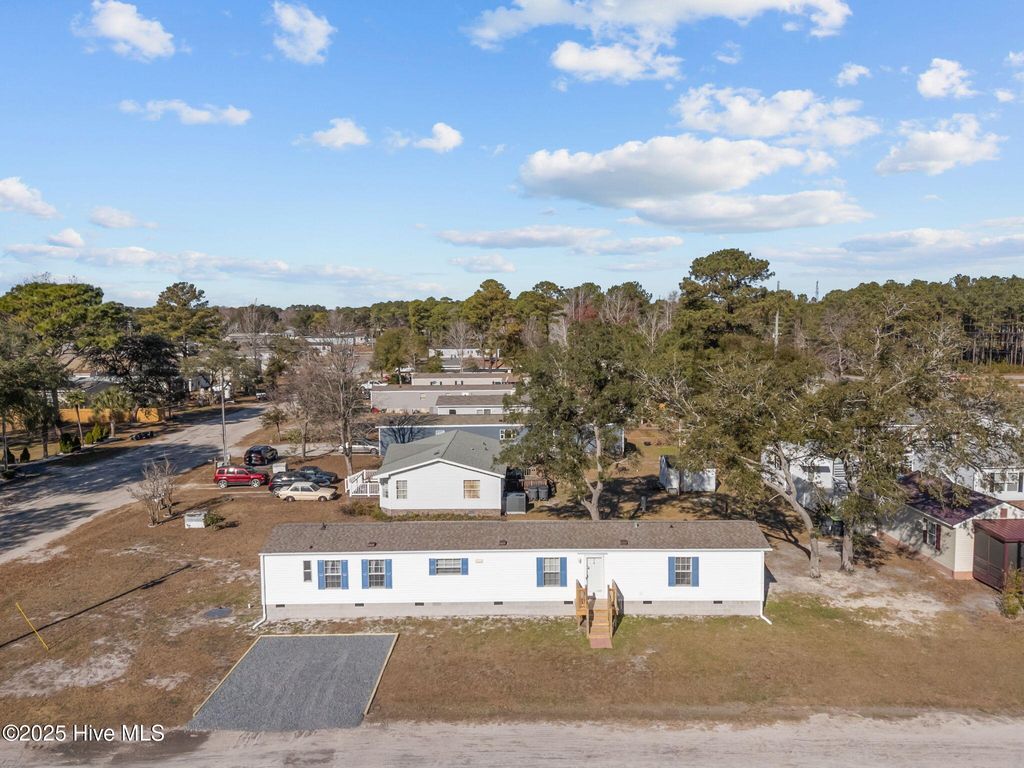Photo of 955 Pineclair Drive SW, Calabash, NC 28467 (MLS # 100545328)