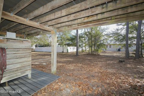 Tiny photo for 114 NW 21st Street, Oak Island, NC 28465 (MLS # 100550833)