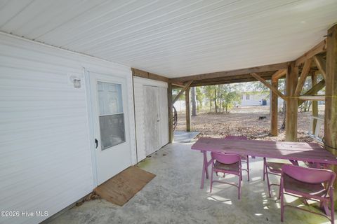 Tiny photo for 114 NW 21st Street, Oak Island, NC 28465 (MLS # 100550833)