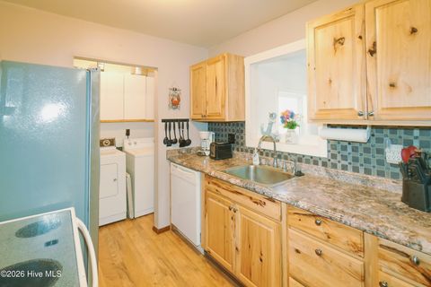 Tiny photo for 114 NW 21st Street, Oak Island, NC 28465 (MLS # 100550833)