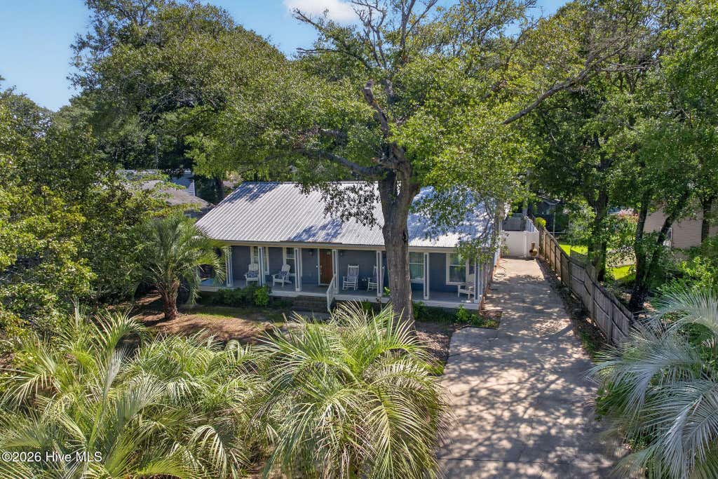 Photo of 108 Paula Circle SE, Oak Island, NC 28465 (MLS # 100597384)