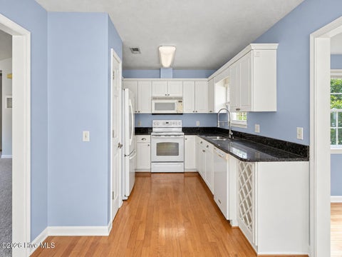 Tiny photo for 121 NE 6th Street, Oak Island, NC 28465 (MLS # 100606384)