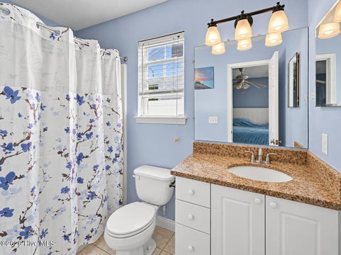 Tiny photo for 121 NE 6th Street, Oak Island, NC 28465 (MLS # 100606384)