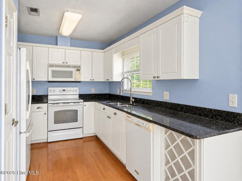 Tiny photo for 121 NE 6th Street, Oak Island, NC 28465 (MLS # 100606384)
