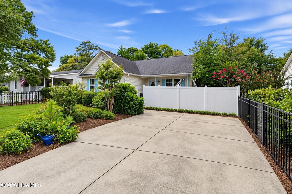 Photo of 121 NE 6th Street, Oak Island, NC 28465 (MLS # 100606384)