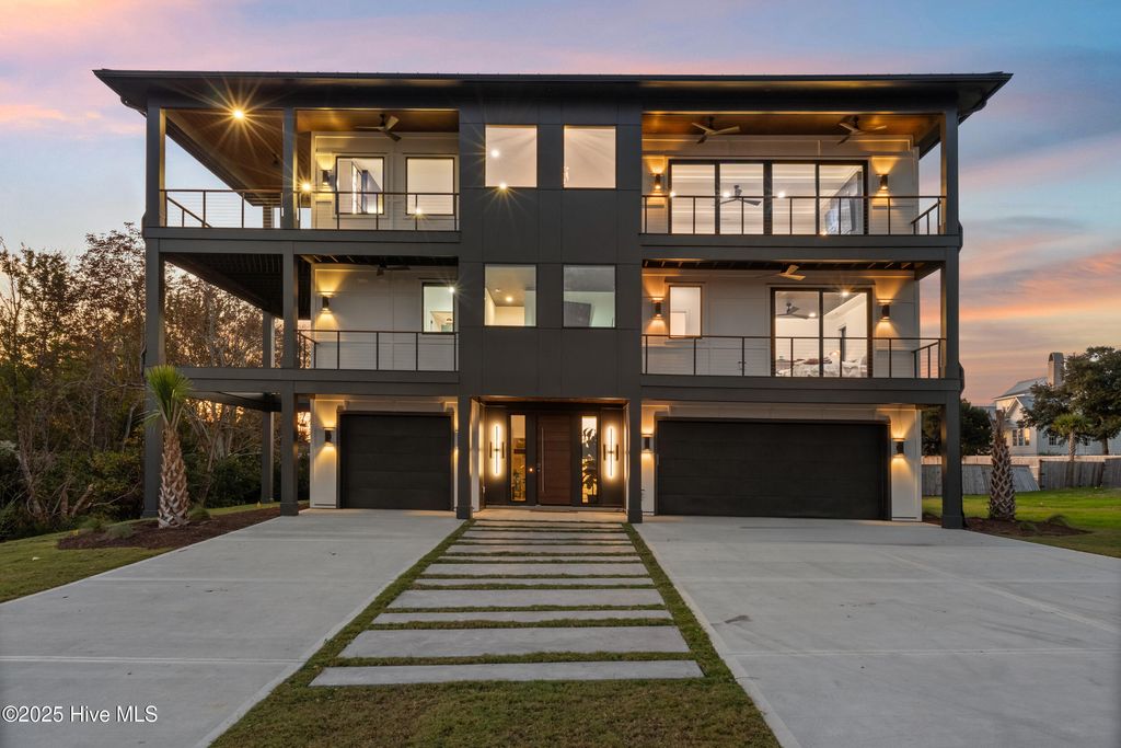 Photo of 141 Dogwood Lane, Hampstead, NC 28443 (MLS # 100560087)