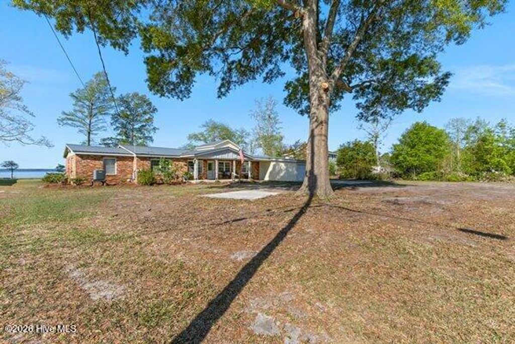 Photo of 1922 Bella Coola Road, Lake Waccamaw, NC 28450 (MLS # 100565102)