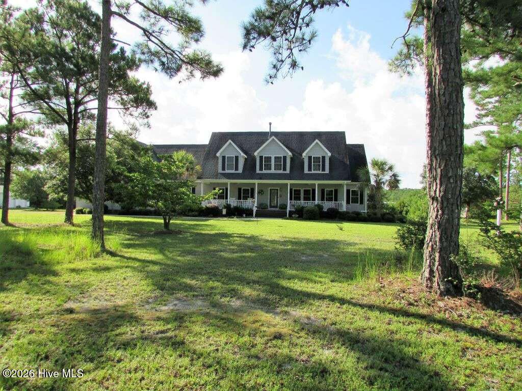 Photo of 158 Stump Sound Church Road, Holly Ridge, NC 28445 (MLS # 100563656)