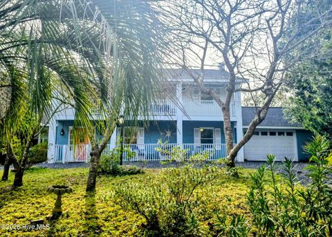 Photo of 115 Paula Circle SE, Oak Island, NC 28465 (MLS # 100549205)