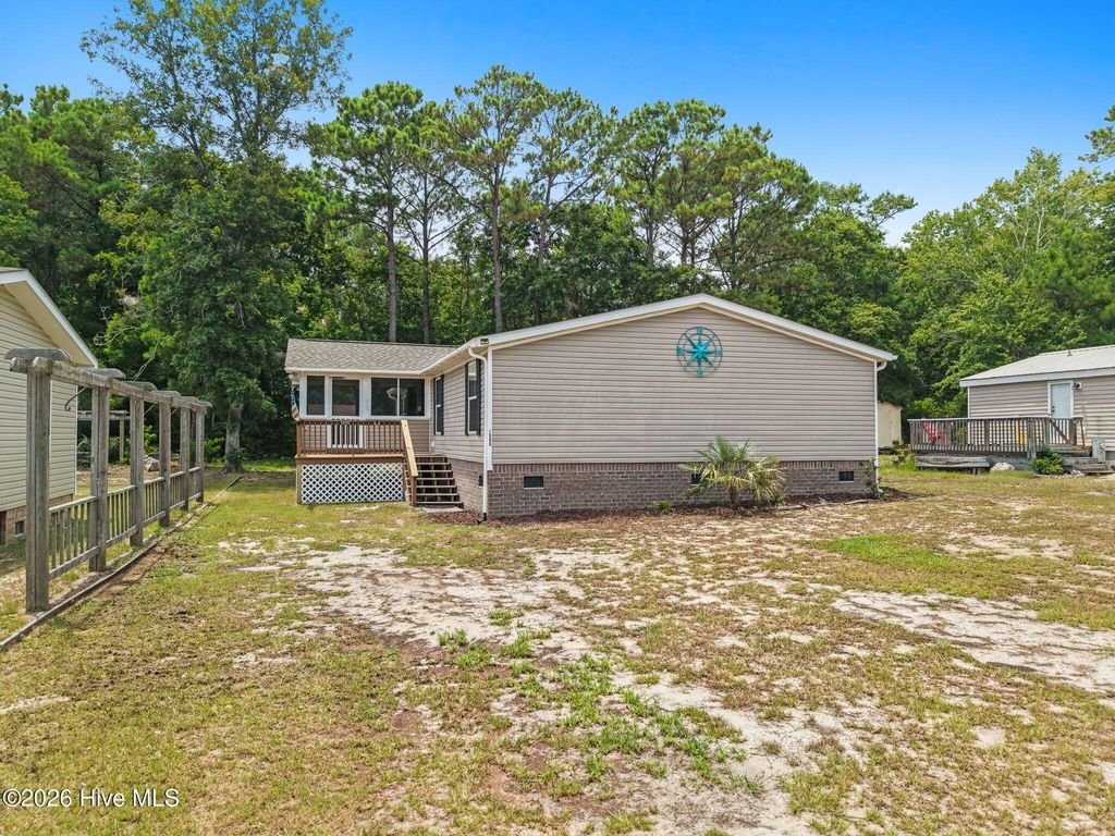 Photo of 1590 W Kilbart Drive SW, Ocean Isle Beach, NC 28469 (MLS # 100589831)