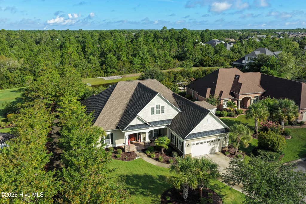 Photo of 8343 Compass Pointe East Wynd NE, Leland, NC 28451 (MLS # 100595086)