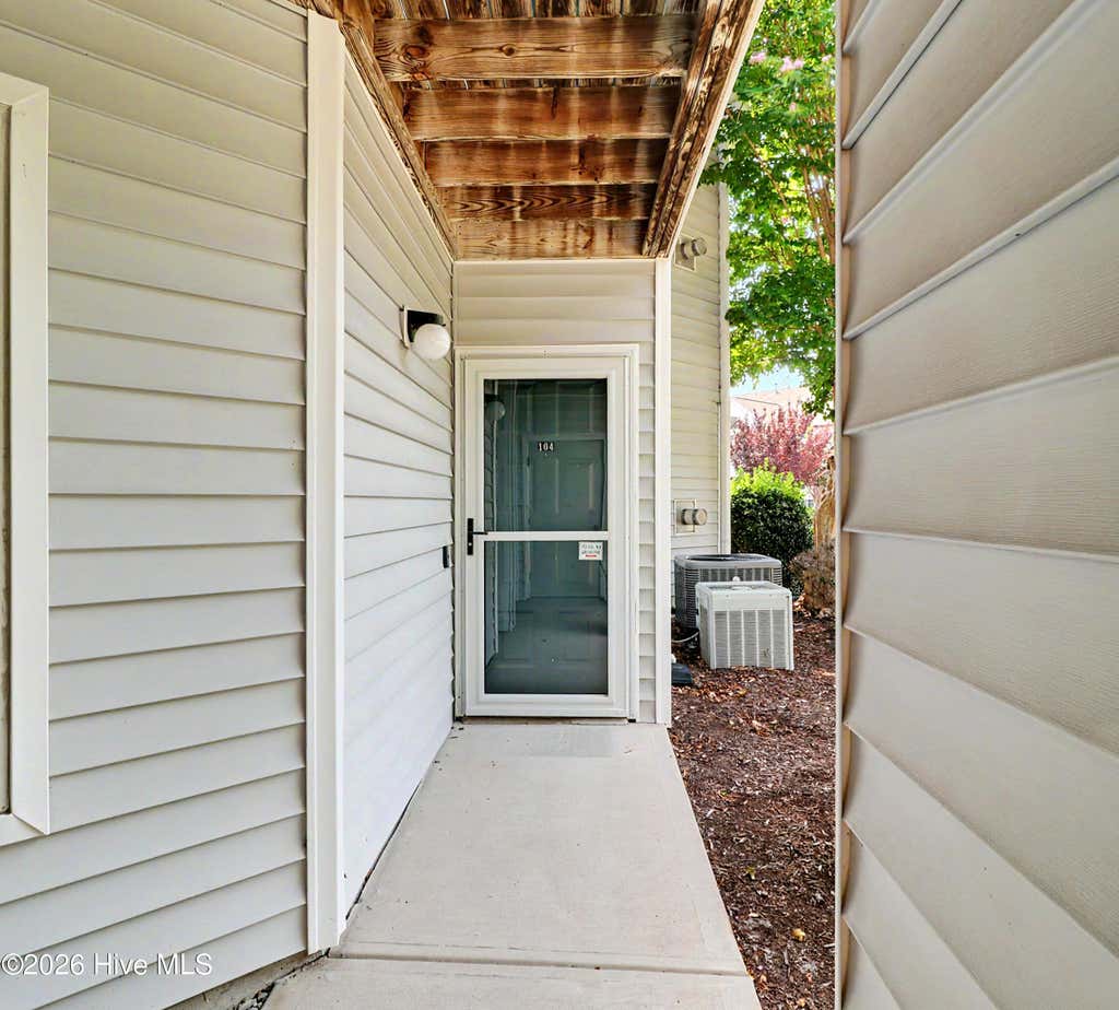 Photo of 4140 Breezewood Drive #Unit 104, Wilmington, NC 28412 (MLS # 100593806)