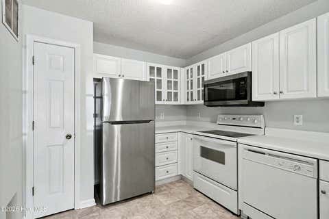 Tiny photo for 4140 Breezewood Drive #Unit 104, Wilmington, NC 28412 (MLS # 100593806)
