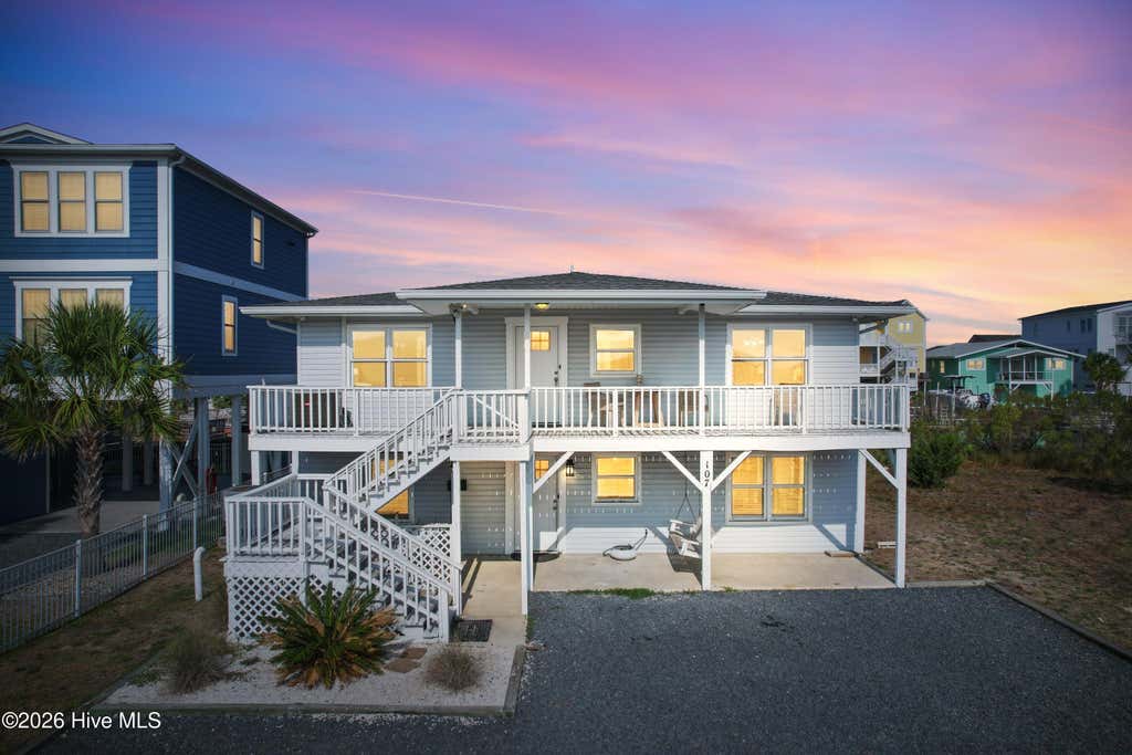 Photo of 107 Lions Paw Street, Holden Beach, NC 28462 (MLS # 100593194)