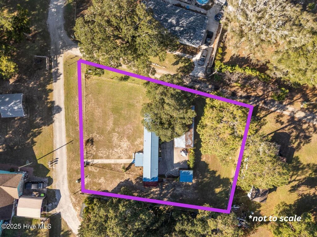 Photo of 1899 Wm And Odell Gurganus Lane SW, Shallotte, NC 28470 (MLS # 100539780)