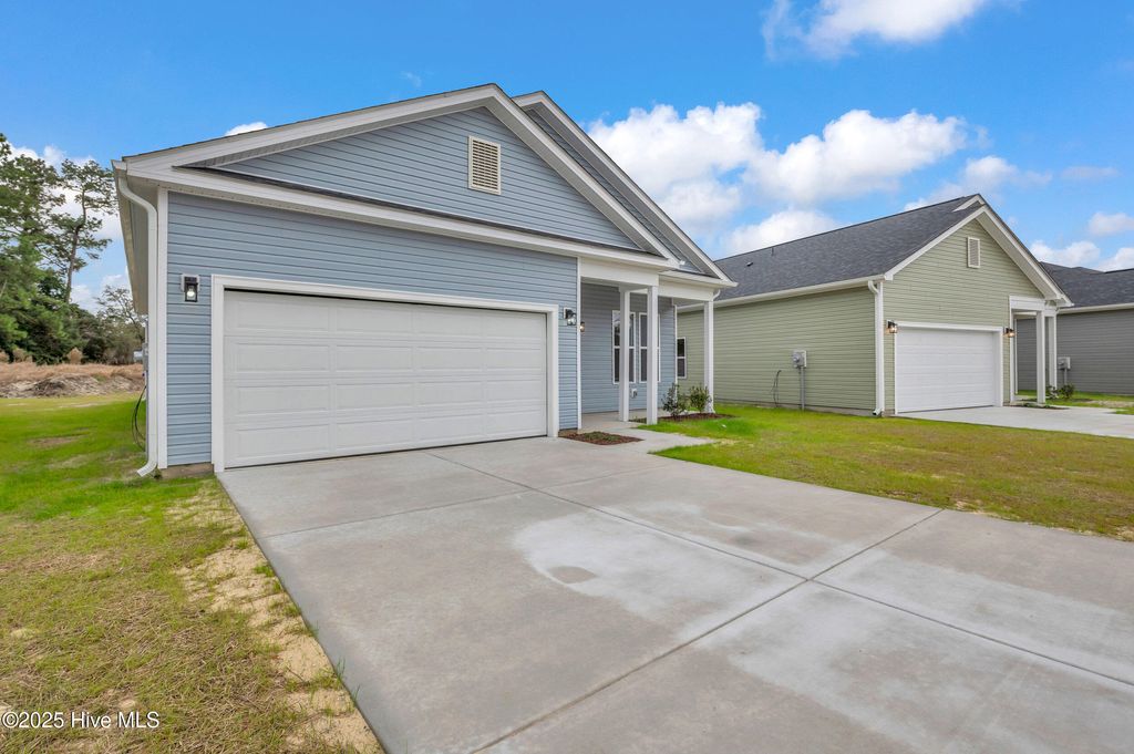 Photo of 1049 Xian Way, Leland, NC 28451 (MLS # 100544591)