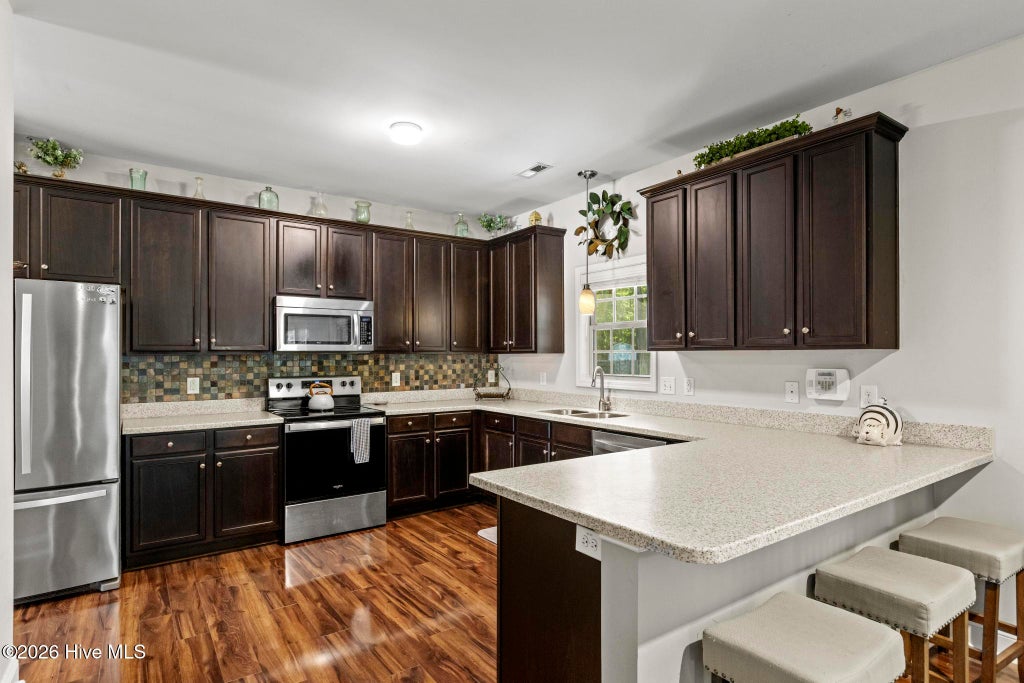 Photo of 605 Weeping Willow Lane, Jacksonville, NC 28540 (MLS # 100597425)