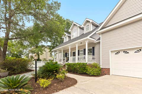 Photo of 102 SW 22nd Street, Oak Island, NC 28465 (MLS # 100580554)