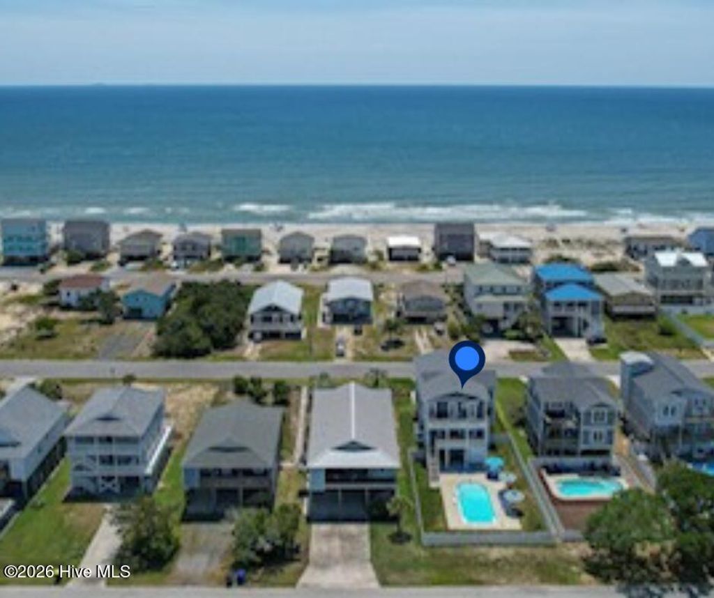Photo of 116 W Dolphin Drive, Oak Island, NC 28465 (MLS # 100553303)