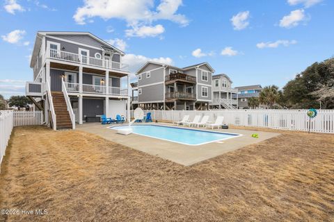 Photo of 116 W Dolphin Drive, Oak Island, NC 28465 (MLS # 100553303)