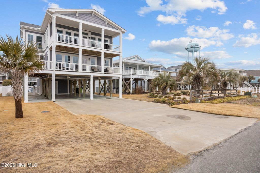 Photo of 116 W Dolphin Drive, Oak Island, NC 28465 (MLS # 100553303)