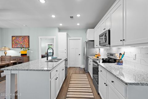 Tiny photo for 116 NE 13th Street, Oak Island, NC 28465 (MLS # 100573492)