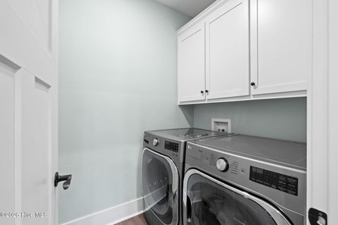 Tiny photo for 116 NE 13th Street, Oak Island, NC 28465 (MLS # 100573492)
