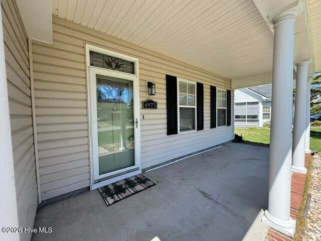 Photo of 4975 N Hampton Drive SE, Southport, NC 28461 (MLS # 100595078)