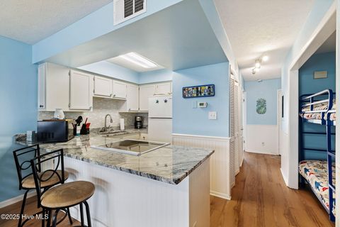 Tiny photo for 1311 Lake Park Boulevard S #2b, Carolina Beach, NC 28428 (MLS # 100546848)