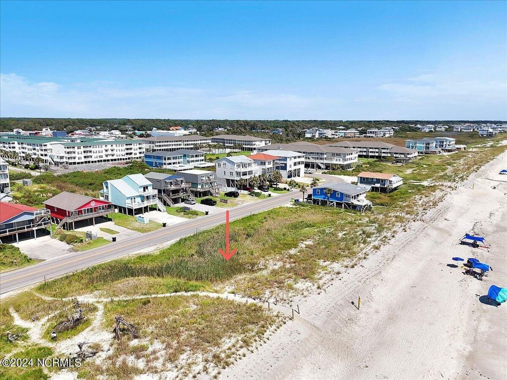 Photo of 5517 E Beach Drive, Oak Island, NC 28465 (MLS # 100464524)