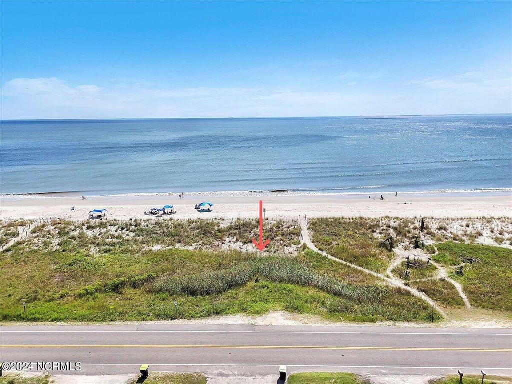 Photo of 5517 E Beach Drive, Oak Island, NC 28465 (MLS # 100464524)