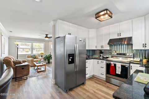 Tiny photo for 302 NE 59th Street, Oak Island, NC 28465 (MLS # 100584826)