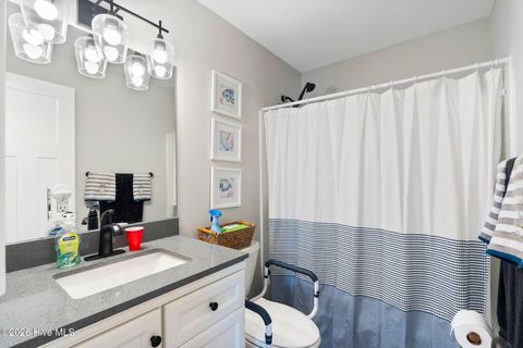 Tiny photo for 302 NE 59th Street, Oak Island, NC 28465 (MLS # 100584826)