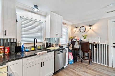 Tiny photo for 302 NE 59th Street, Oak Island, NC 28465 (MLS # 100584826)