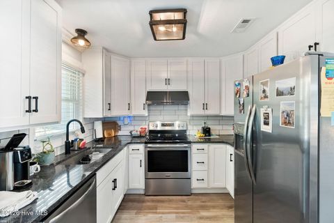 Tiny photo for 302 NE 59th Street, Oak Island, NC 28465 (MLS # 100584826)