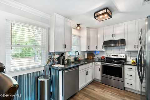 Tiny photo for 302 NE 59th Street, Oak Island, NC 28465 (MLS # 100584826)