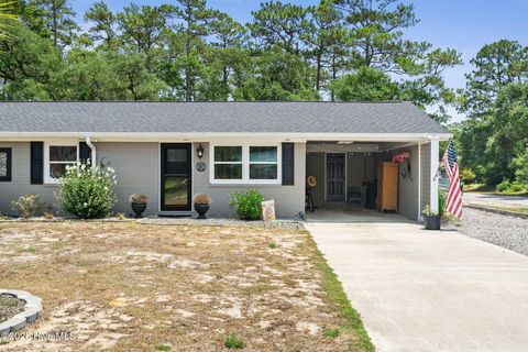Tiny photo for 302 NE 59th Street, Oak Island, NC 28465 (MLS # 100584826)
