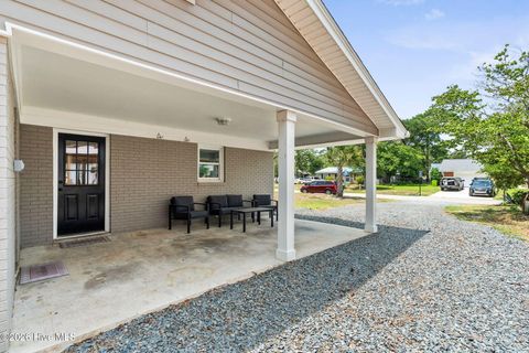 Tiny photo for 302 NE 59th Street, Oak Island, NC 28465 (MLS # 100584826)