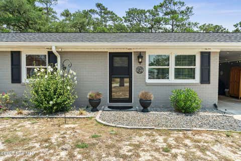 Tiny photo for 302 NE 59th Street, Oak Island, NC 28465 (MLS # 100584826)