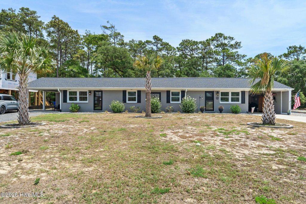 Photo of 302 NE 59th Street, Oak Island, NC 28465 (MLS # 100584826)