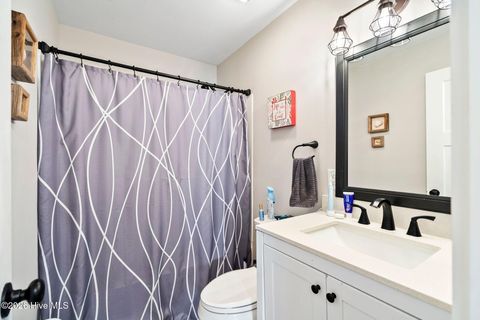 Tiny photo for 302 NE 59th Street, Oak Island, NC 28465 (MLS # 100584826)