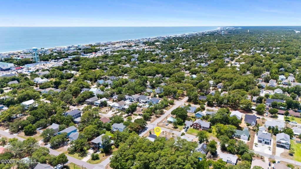Photo of 302 NE 59th Street, Oak Island, NC 28465 (MLS # 100584826)