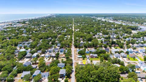 Tiny photo for 302 NE 59th Street, Oak Island, NC 28465 (MLS # 100584826)