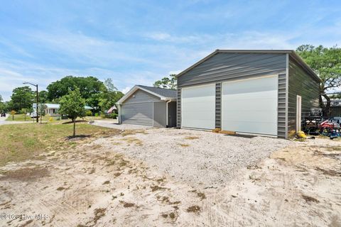 Tiny photo for 302 NE 59th Street, Oak Island, NC 28465 (MLS # 100584826)