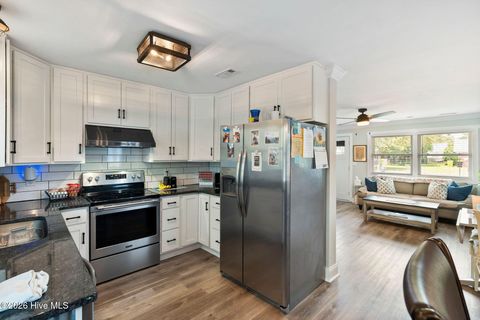 Tiny photo for 302 NE 59th Street, Oak Island, NC 28465 (MLS # 100584826)
