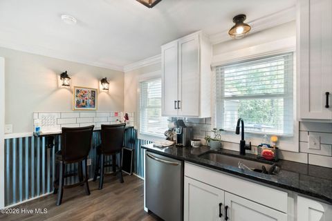 Tiny photo for 302 NE 59th Street, Oak Island, NC 28465 (MLS # 100584826)