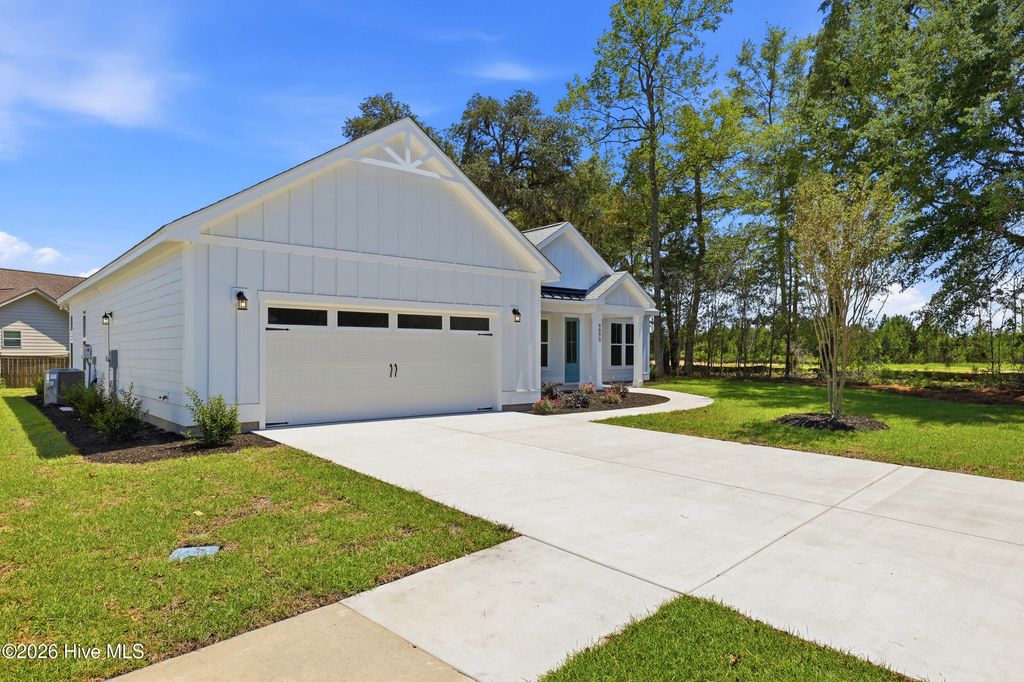 Photo of 4890 Olde Cypress Lane, Shallotte, NC 28470 (MLS # 100585103)