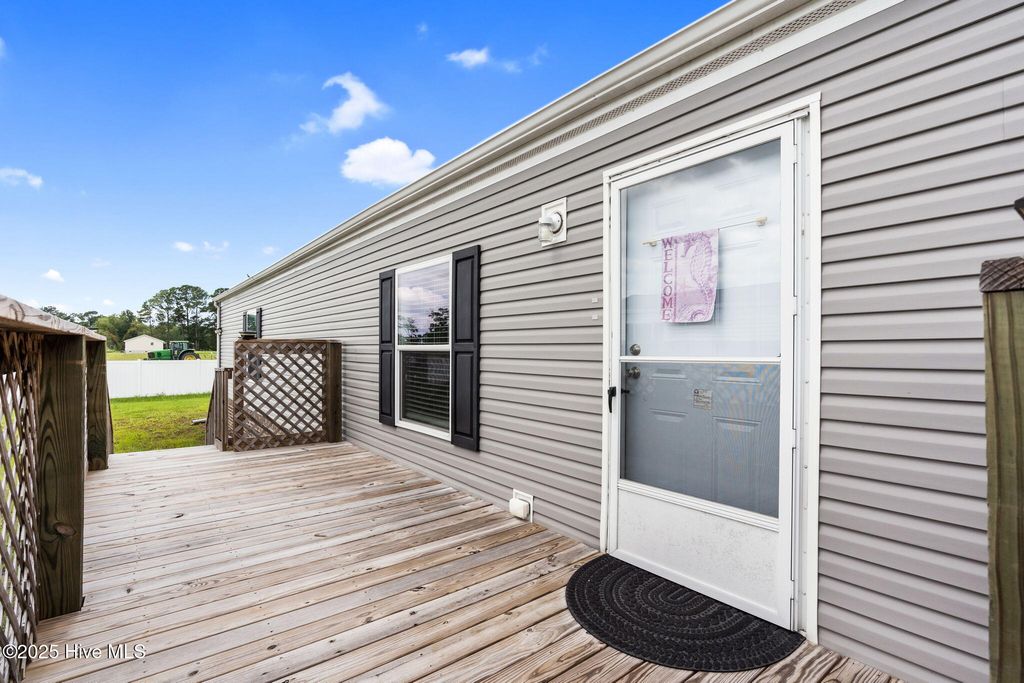 Photo of 930 Pineclair Drive SW, Calabash, NC 28467 (MLS # 100526745)